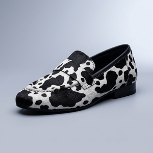 Black Shoes For Women | Slip-On Loafers Cow Print Black and White three-quarter front view