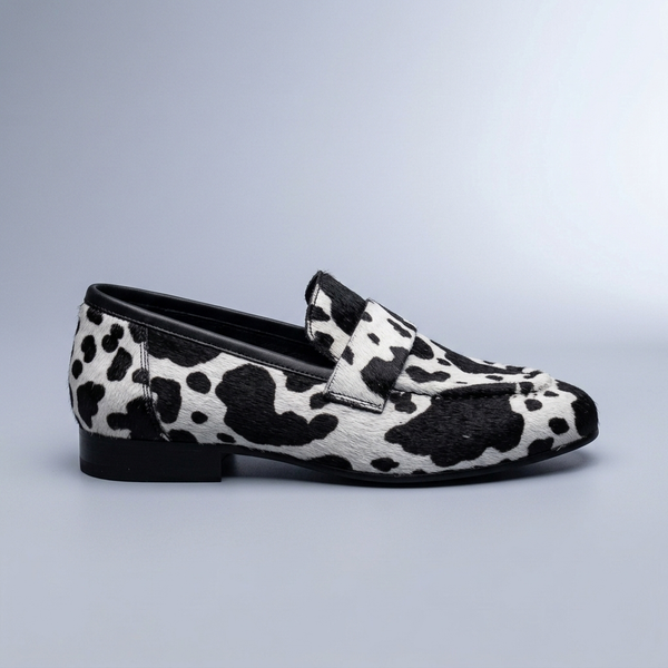 Black Shoes For Women | Slip-On Loafers Cow Print Black and White side profile