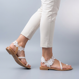 White Sandals For Women | Floral Lace Toe Ring Ankle Strap White worn side view sole