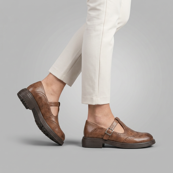 Mary Jane Shoes For Women | Brogue Detail Buckle Strap Leather Brown worn side view sole